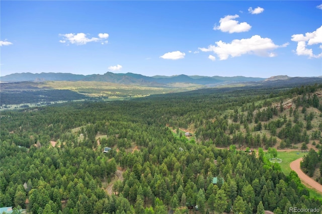 2255 Spruce Rd, Woodland Park, CO 80863 - mountain view featuring a heavily wooded area