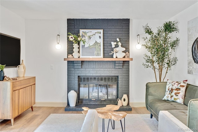 10016 Teton Ct, Lone Tree, CO 80124 - living room with light wood-type flooring and a fireplace