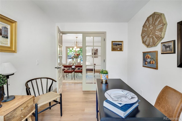 10016 Teton Ct, Lone Tree, CO 80124 - dining area with light wood-type flooring and a chandelier