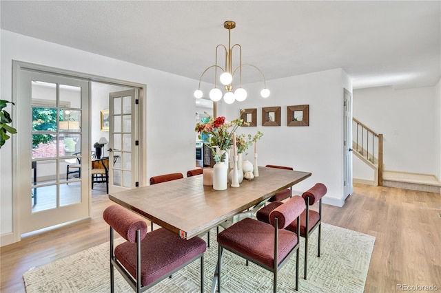 10016 Teton Ct, Lone Tree, CO 80124 - dining room featuring stairs and light wood finished floors