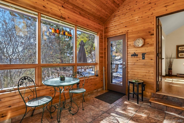 sunroom / solarium with vaulted ceiling and wooden ceiling