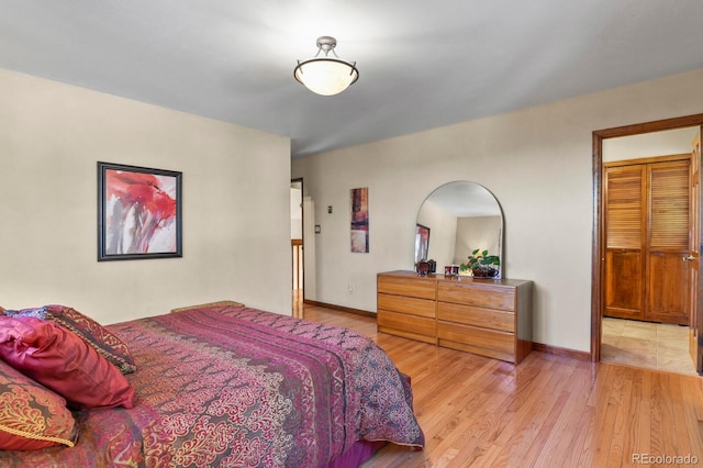 bedroom featuring light wood-type flooring