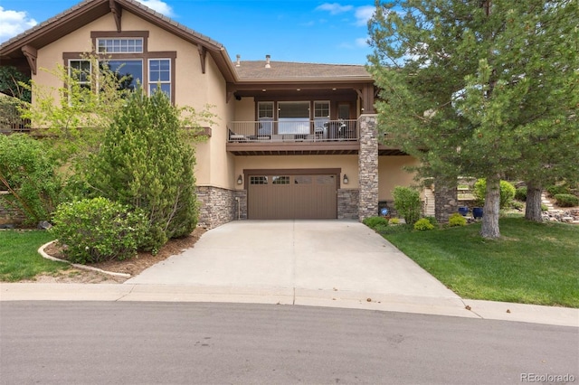 4364 Chateau Ridge Ln, Castle Rock, CO 80108 - townhome / multi-family property featuring a balcony, stucco siding, stone siding, and driveway