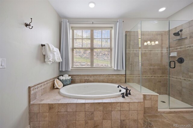 4364 Chateau Ridge Ln, Castle Rock, CO 80108 - bathroom with a garden tub, a shower stall, and recessed lighting