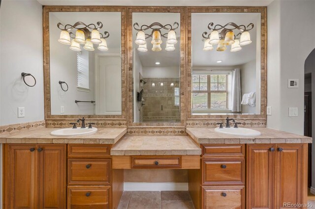 4364 Chateau Ridge Ln, Castle Rock, CO 80108 - full bathroom with a tile shower and double vanity