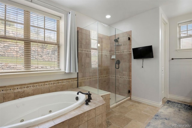 4364 Chateau Ridge Ln, Castle Rock, CO 80108 - full bathroom with a whirlpool tub, a shower stall, and recessed lighting