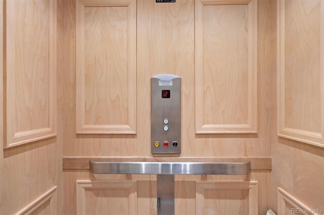4364 Chateau Ridge Ln, Castle Rock, CO 80108 - elevator featuring wood walls
