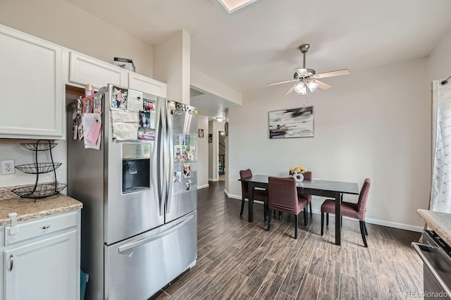 kitchen featuring dark wood-style floors, white cabinets, light countertops, and stainless steel fridge with ice dispenser