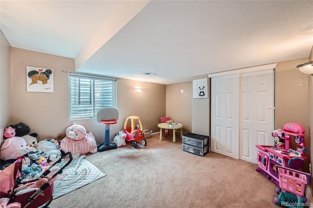 playroom featuring carpet flooring and visible vents