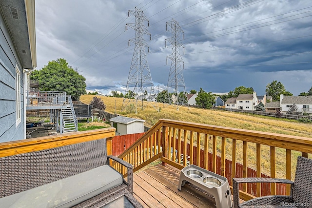 wooden deck featuring stairway