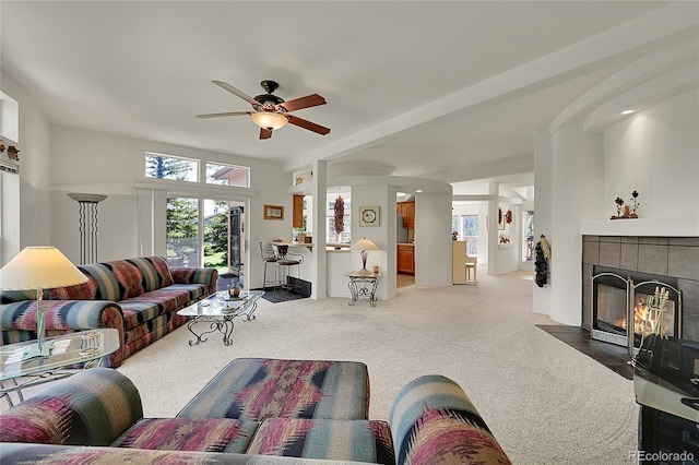 153 Gold Run Trl, Idaho Springs, CO 80452 - living room with ceiling fan, carpet flooring, and a fireplace