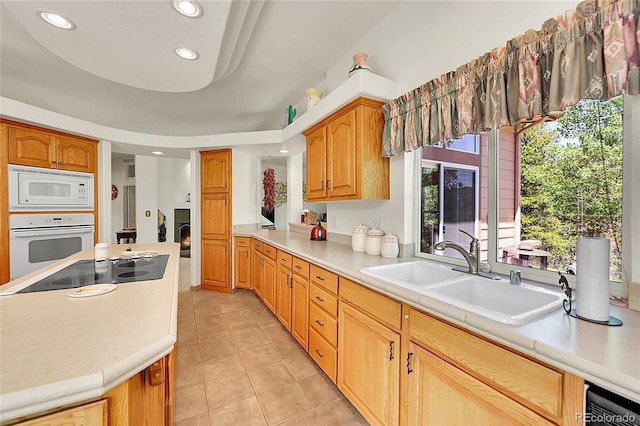 153 Gold Run Trl, Idaho Springs, CO 80452 - kitchen featuring white appliances, light countertops, light tile patterned flooring, and recessed lighting