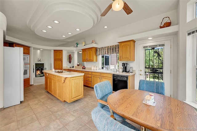 153 Gold Run Trl, Idaho Springs, CO 80452 - kitchen featuring black appliances, light countertops, recessed lighting, a ceiling fan, and a center island