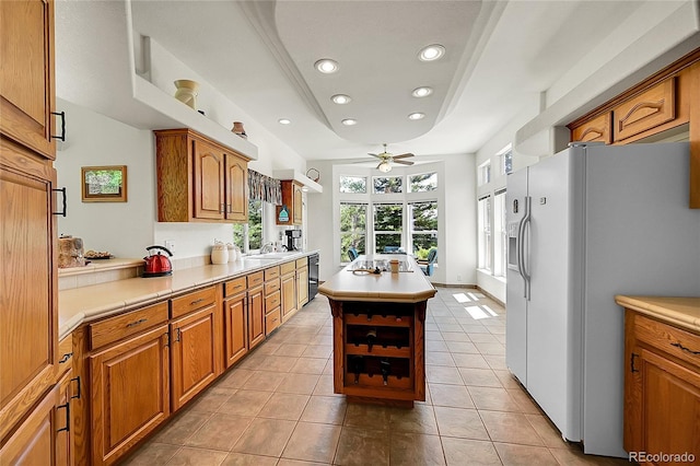 153 Gold Run Trl, Idaho Springs, CO 80452 - kitchen featuring white fridge with ice dispenser, a ceiling fan, recessed lighting, light countertops, and brown cabinetry