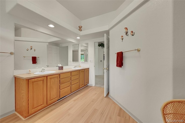 153 Gold Run Trl, Idaho Springs, CO 80452 - bathroom featuring wood finished floors, double vanity, and recessed lighting