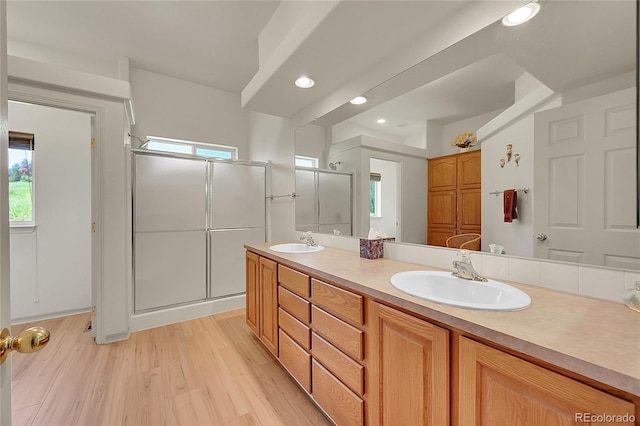 153 Gold Run Trl, Idaho Springs, CO 80452 - bathroom featuring double vanity, plenty of natural light, a stall shower, and recessed lighting