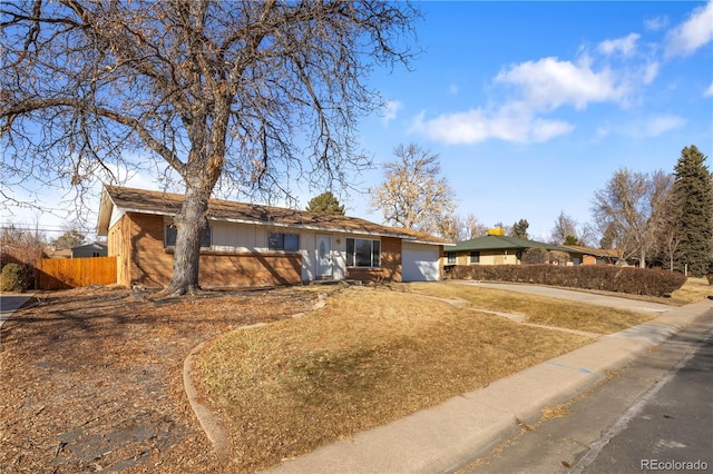 ranch-style home with a garage