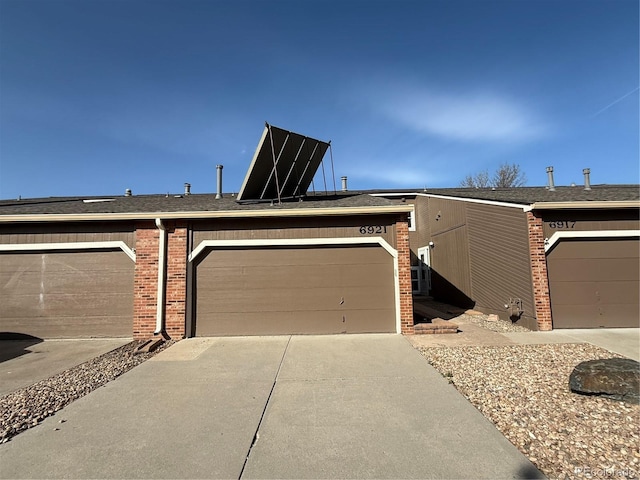 6921 S Bryant St, Littleton, CO 80120 - view of front of home featuring brick siding