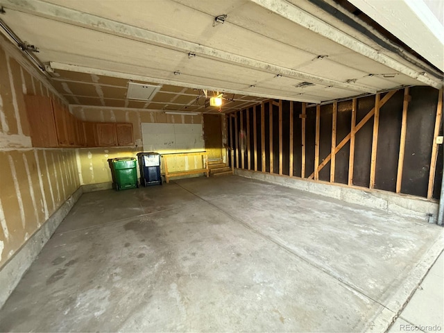 6921 S Bryant St, Littleton, CO 80120 - garage featuring a garage door opener