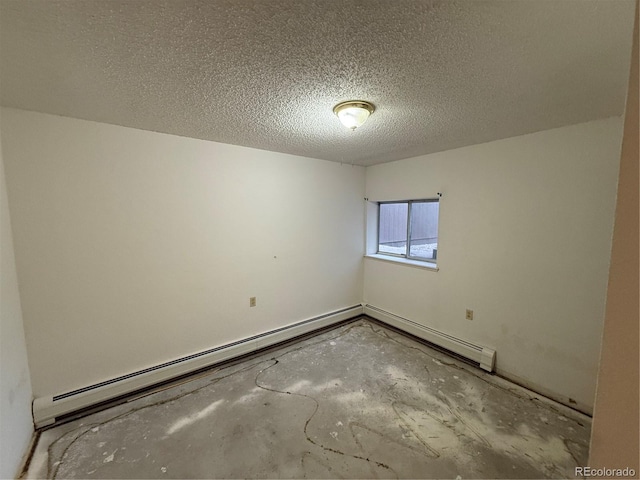 6921 S Bryant St, Littleton, CO 80120 - spare room with a textured ceiling and a baseboard heating unit