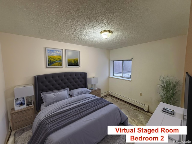 6921 S Bryant St, Littleton, CO 80120 - bedroom featuring a baseboard heating unit, a textured ceiling, and baseboards