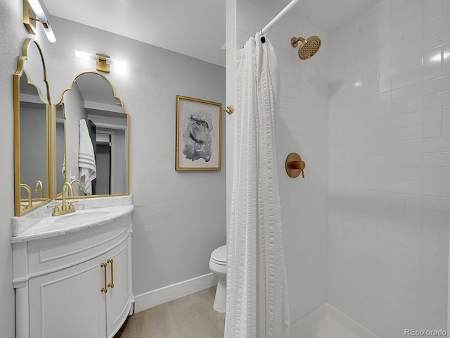 bathroom featuring vanity, a shower with curtain, toilet, and tile patterned flooring