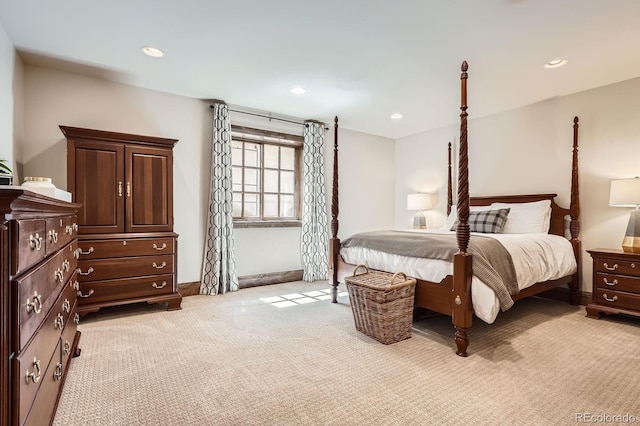 bedroom featuring recessed lighting, baseboards, and light colored carpet