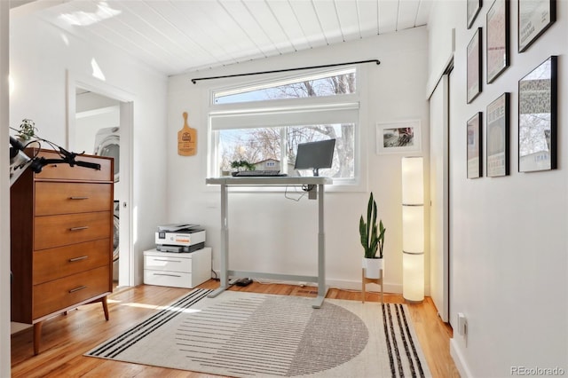 interior space featuring light wood-style floors and wooden ceiling