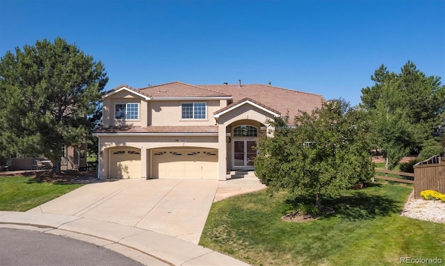 10085 Charissglen Ct, Highlands Ranch, CO 80126 - traditional home featuring stucco siding, a garage, concrete driveway, and a tiled roof