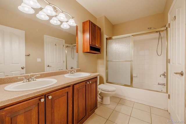 10085 Charissglen Ct, Highlands Ranch, CO 80126 - bathroom featuring tile patterned flooring, double vanity, and enclosed tub / shower combo