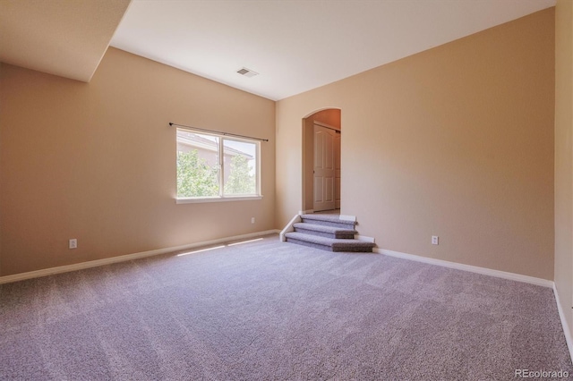 10085 Charissglen Ct, Highlands Ranch, CO 80126 - carpeted empty room with arched walkways and baseboards
