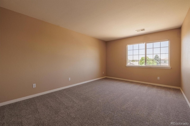 10085 Charissglen Ct, Highlands Ranch, CO 80126 - carpeted empty room featuring baseboards