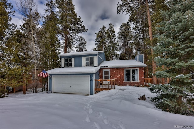 front of property with a garage