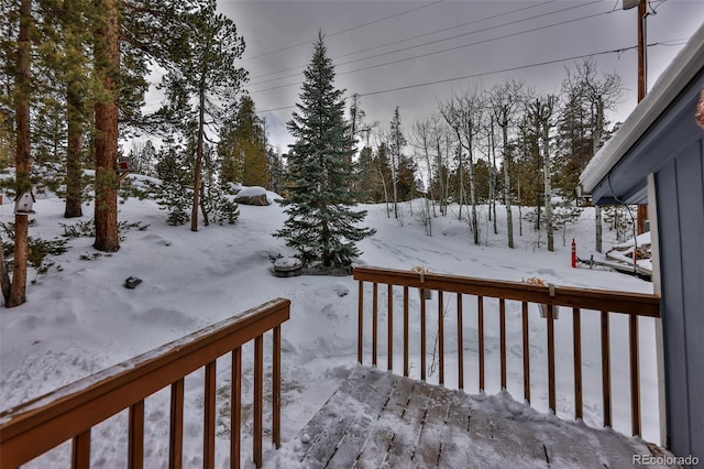 view of snow covered deck