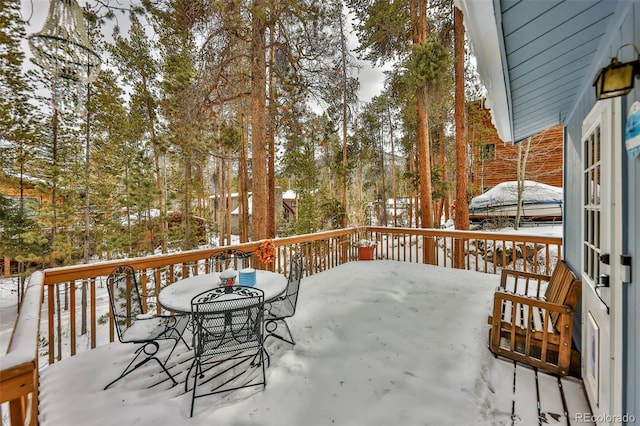 view of snow covered deck