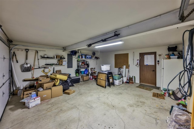 garage featuring white refrigerator