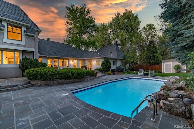 1512 Cottonwood Ln, Greenwood Village, CO 80121 - pool at dusk with a patio