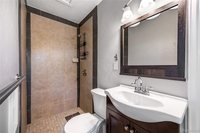 1560 Pueblo Ct, Thornton, CO 80229 - bathroom with vanity, toilet, and tiled shower
