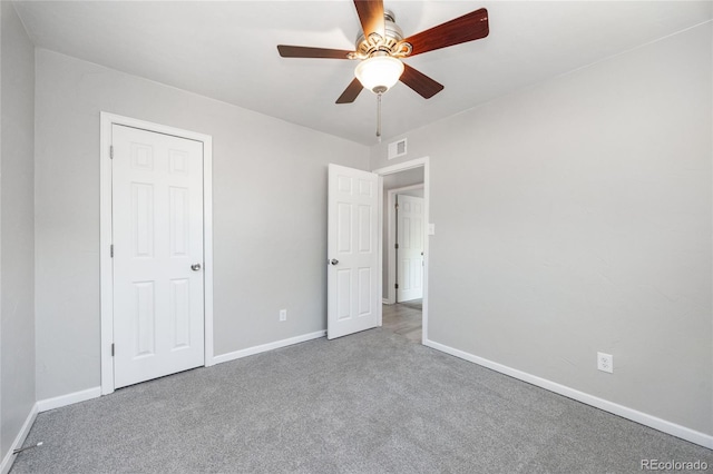 1560 Pueblo Ct, Thornton, CO 80229 - unfurnished bedroom with carpet, baseboards, and a ceiling fan
