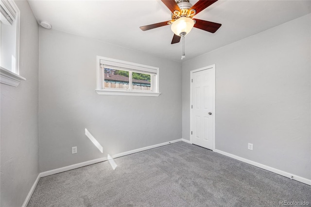 1560 Pueblo Ct, Thornton, CO 80229 - carpeted spare room with baseboards, a ceiling fan, and a smoke detector