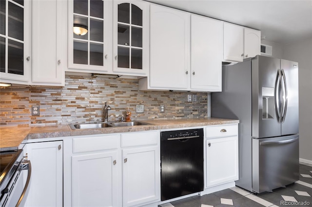 1560 Pueblo Ct, Thornton, CO 80229 - kitchen featuring stainless steel appliances, a sink, and white cabinetry