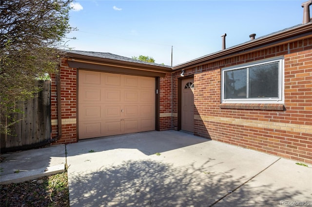 1560 Pueblo Ct, Thornton, CO 80229 - garage featuring driveway