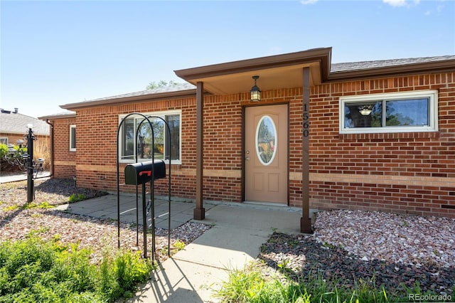 1560 Pueblo Ct, Thornton, CO 80229 - property entrance with brick siding