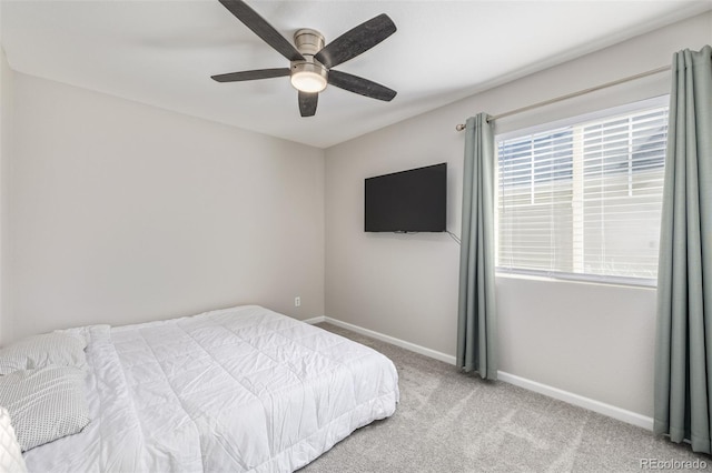 bedroom featuring carpet flooring, ceiling fan, and baseboards