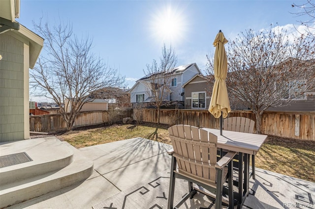 view of patio / terrace with a fenced backyard and outdoor dining area