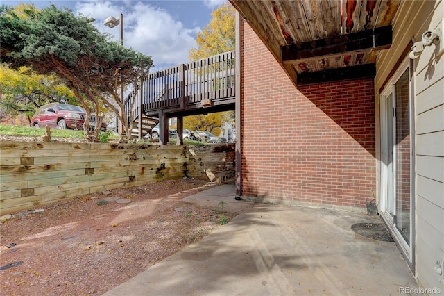 view of patio / terrace featuring a wooden deck