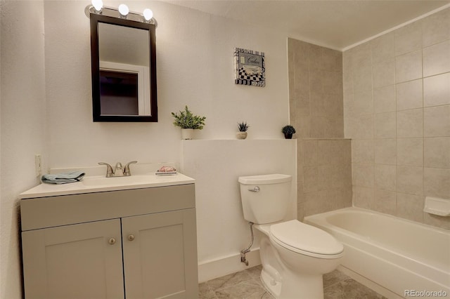 full bathroom with toilet, vanity, tile patterned floors, and bathtub / shower combination