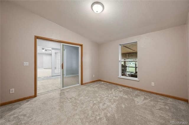 5520 Coyote Ln, Peyton, CO 80831 - empty room with carpet and lofted ceiling