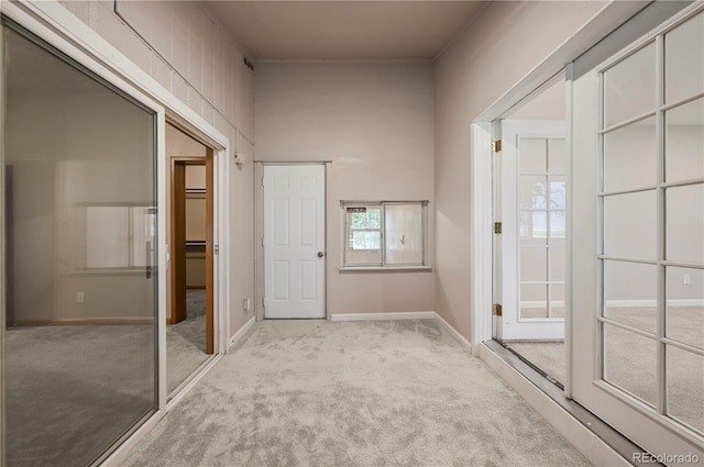 5520 Coyote Ln, Peyton, CO 80831 - doorway featuring carpet flooring and baseboards