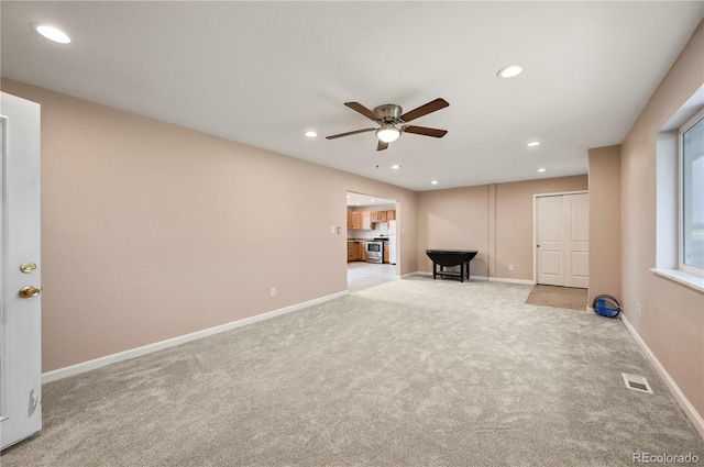 5520 Coyote Ln, Peyton, CO 80831 - interior space featuring carpet, ceiling fan, and recessed lighting